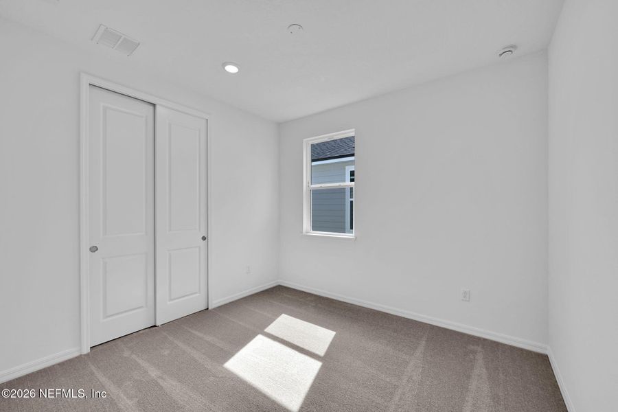 Spacious, unfurnished interior of a new home in Westerly Park at Wildlight, Yulee (Image 21).