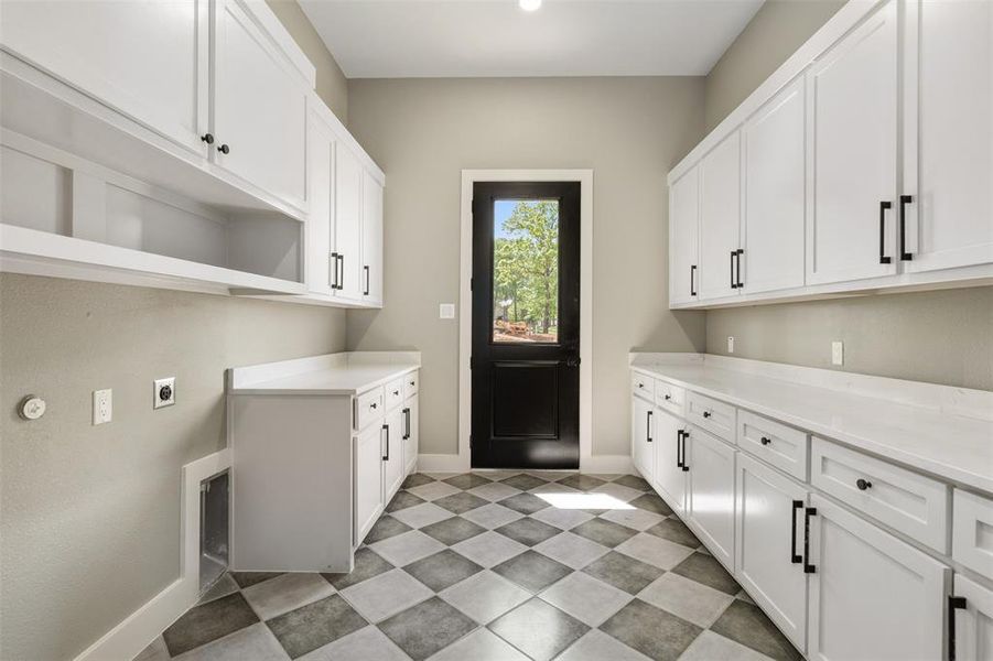 Big laundry room and butler pantry with storage and outlets for small appliances