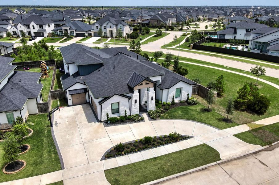 A large corner lot adjacent to a beautiful green space provides privacy and the benefit of NO BACK OR SIDE NEIGHBOR!