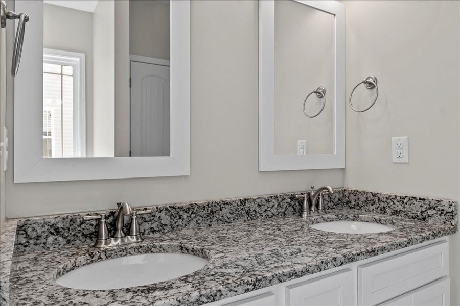 Representative interior finishes for a home built from the Cherokee by Enchanted Homes in Lonesome Dove, San Antonio (Image 18).
