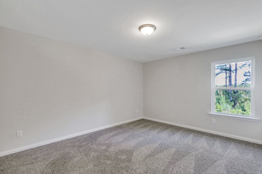 Spacious, unfurnished interior of a new home in Settlers Hammock, Kingsland (Image 17).