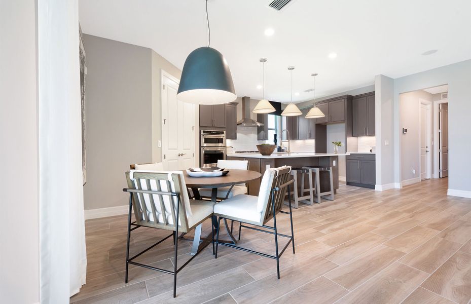 Representative furnished interior of a home built from the Easley by DiVosta in Emerson Oaks, Vero Beach (Image 26).