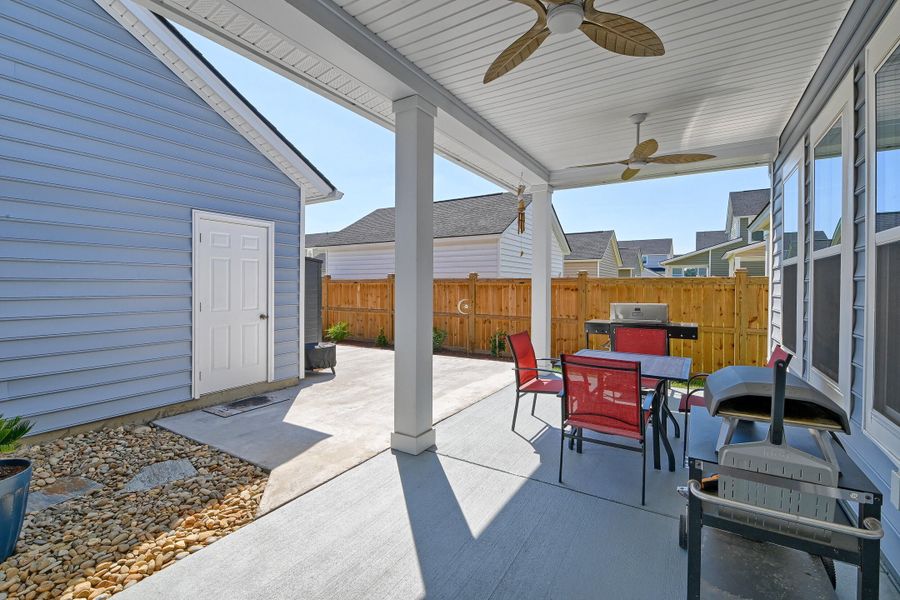 Exterior details and patio area of a home in Heron's Walk at Summers Corner, Summerville (Image 23).