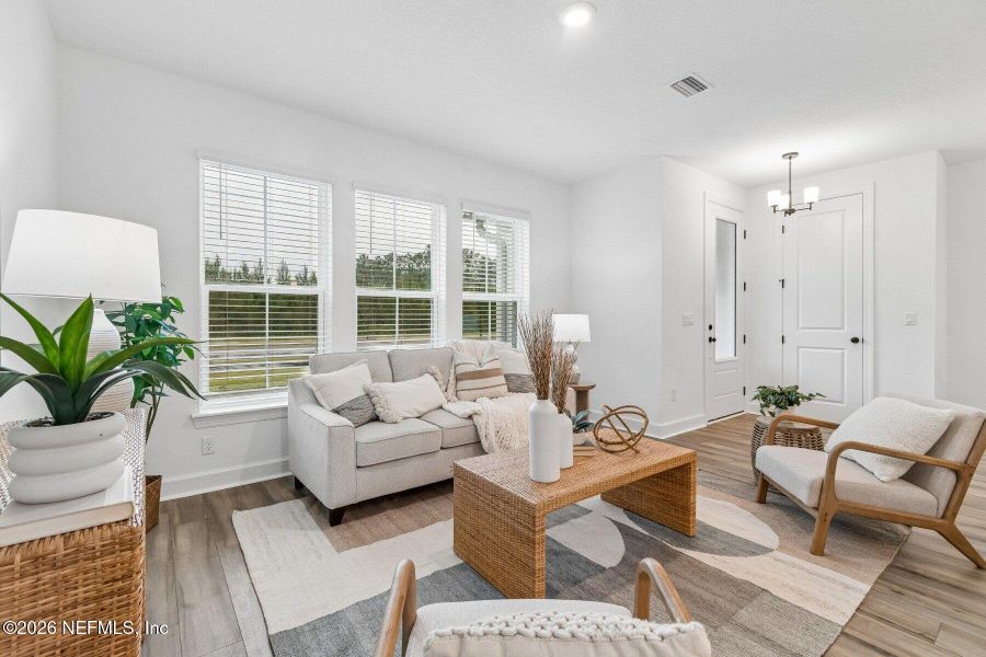 Furnished interior view inside a new home in Westerly Park at Wildlight - Courtyard Collection, Yulee (Image 11).