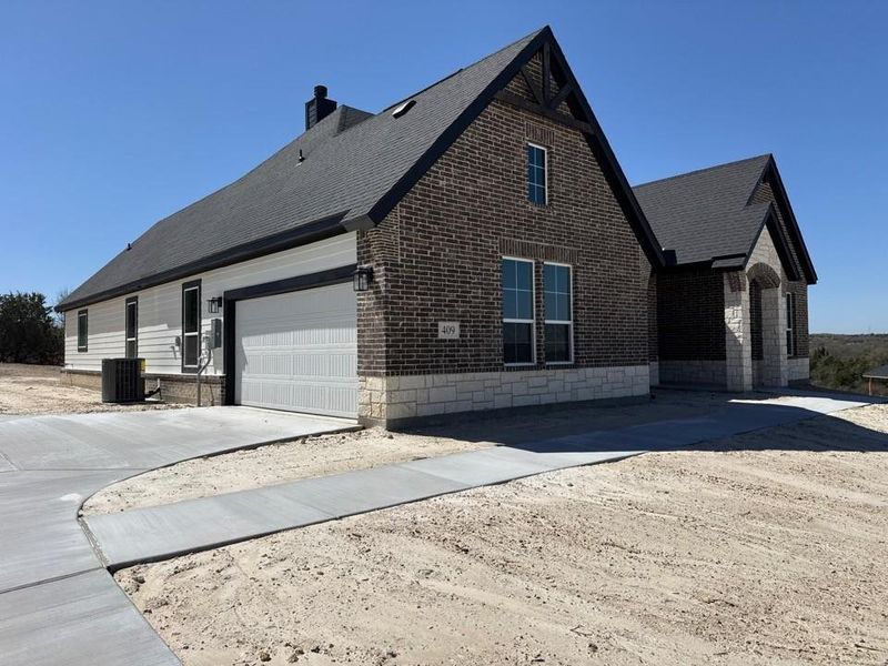 Exterior details and patio area of a home in Oak Grove Addition, Springtown (Image 3). Exterior details and patio area of a home in Oak Grove Addition, Springtown (Image 3).