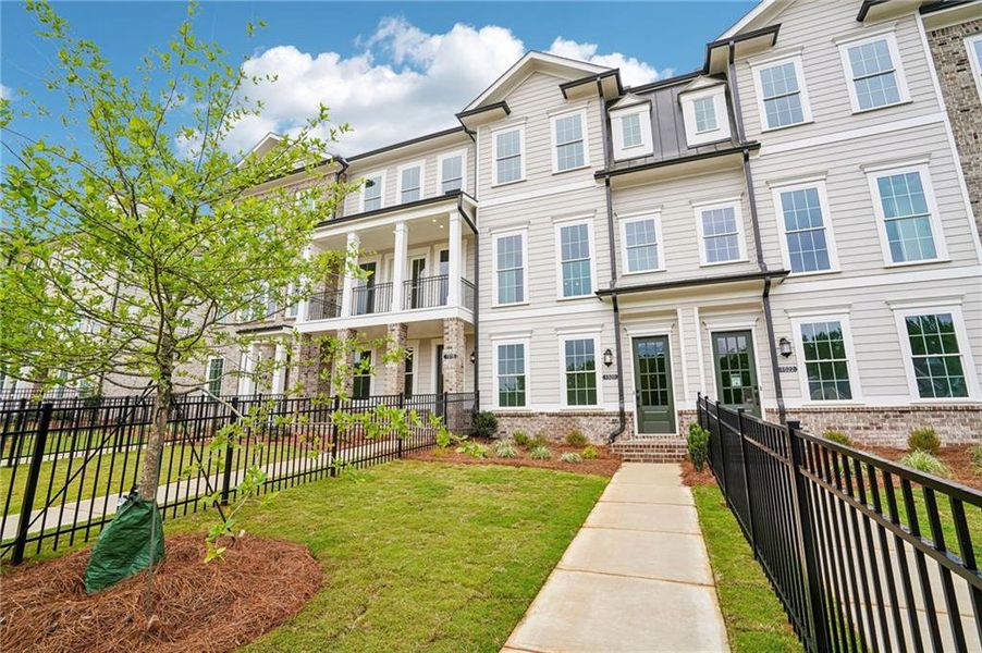 Front exterior of a new home in Waterhaven, Cumming, GA, highlighting curb appeal (Image 24).