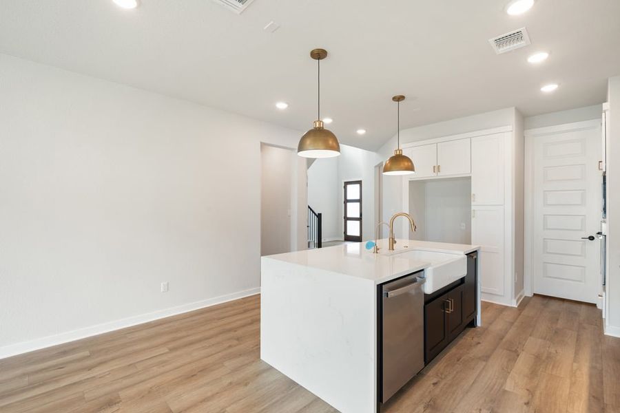 Furnished interior view inside a new home in Terrace Collection at Lariat, Liberty Hill (Image 9). Furnished interior view inside a new home in Terrace Collection at Lariat, Liberty Hill (Image 9).