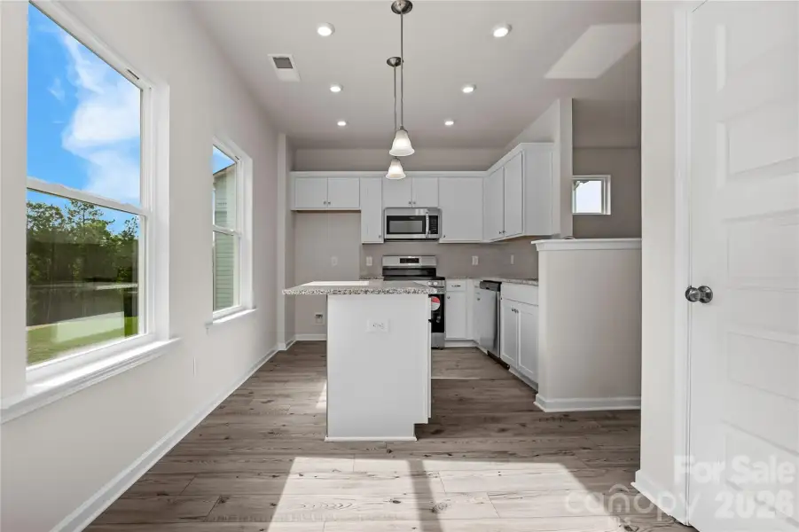 Furnished interior view inside a new home in Rowe Crossing, Newton (Image 7).