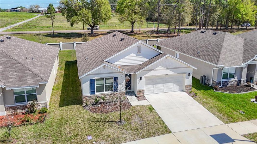 Front exterior of a new home in , San Antonio, FL, highlighting curb appeal (Image 23).