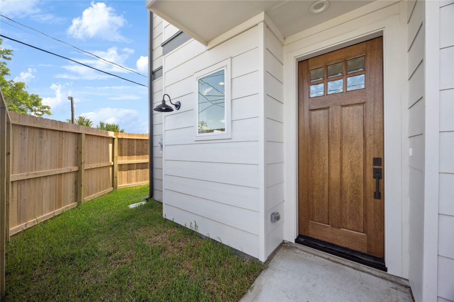 Exterior details and patio area of a home in , Houston (Image 4).