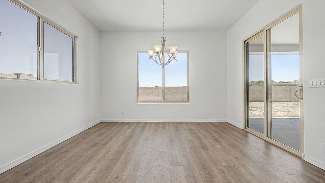 Representative furnished interior of a home built from the Granada by DRB Homes in Windrose, Waddell (Image 7).