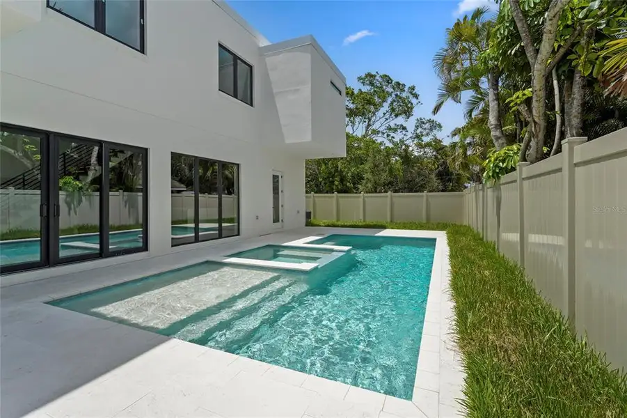 Exterior details and patio area of a home in , Sarasota (Image 43).