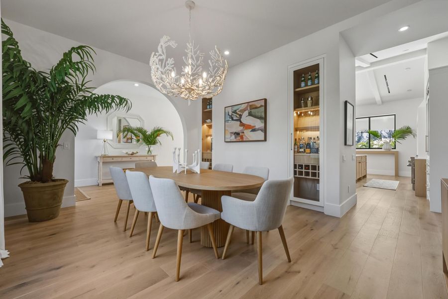 Formal dining room flows effortlessly into kitchen