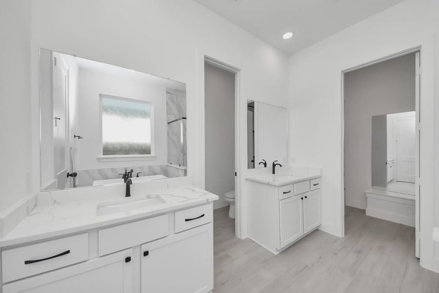 Representative furnished interior of a home built from the Summerton by Chesmar Homes in Meridiana 50's and 60's, Manvel (Image 37).