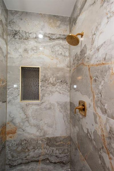 Bathroom with tiled shower