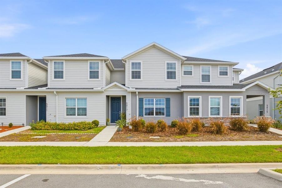 Front exterior of a new home in , St. Cloud, FL, highlighting curb appeal (Image 21). Front exterior of a new home in , St. Cloud, FL, highlighting curb appeal (Image 21).