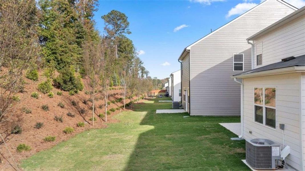 Exterior details and patio area of a home in Poplar Preserve, Newnan (Image 2). Exterior details and patio area of a home in Poplar Preserve, Newnan (Image 2).