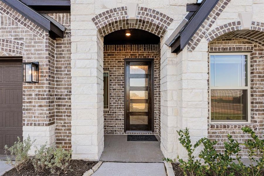 Exterior details and patio area of a home in Coyote Crossing, Godley (Image 4). Exterior details and patio area of a home in Coyote Crossing, Godley (Image 4).
