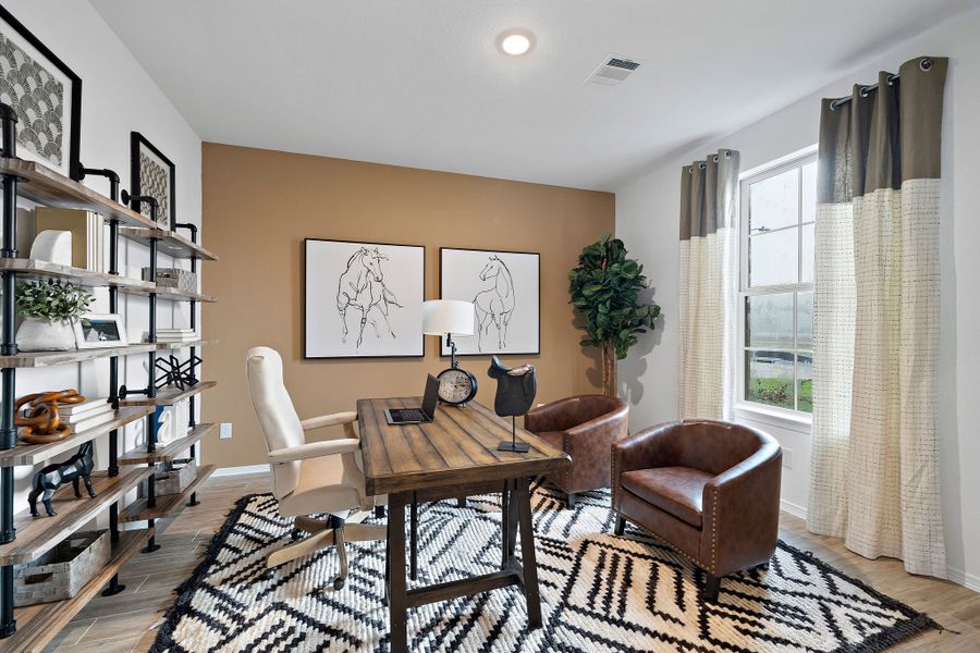 A room with a table and chairs. A room with a table and chairs.