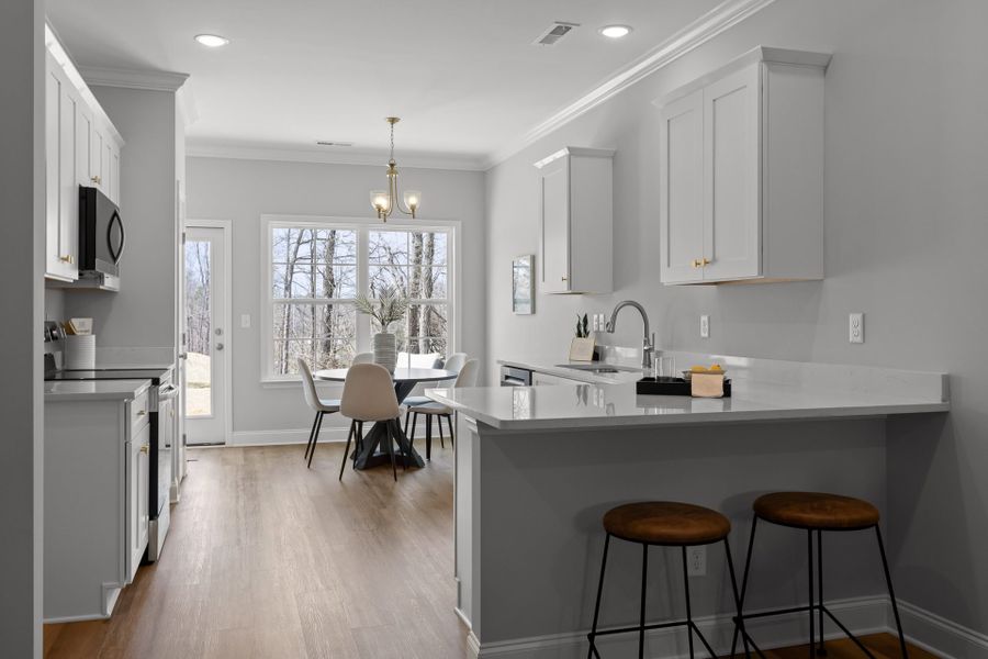 Furnished interior in a model home at The Eleuthera in Chattanooga (Image 30).