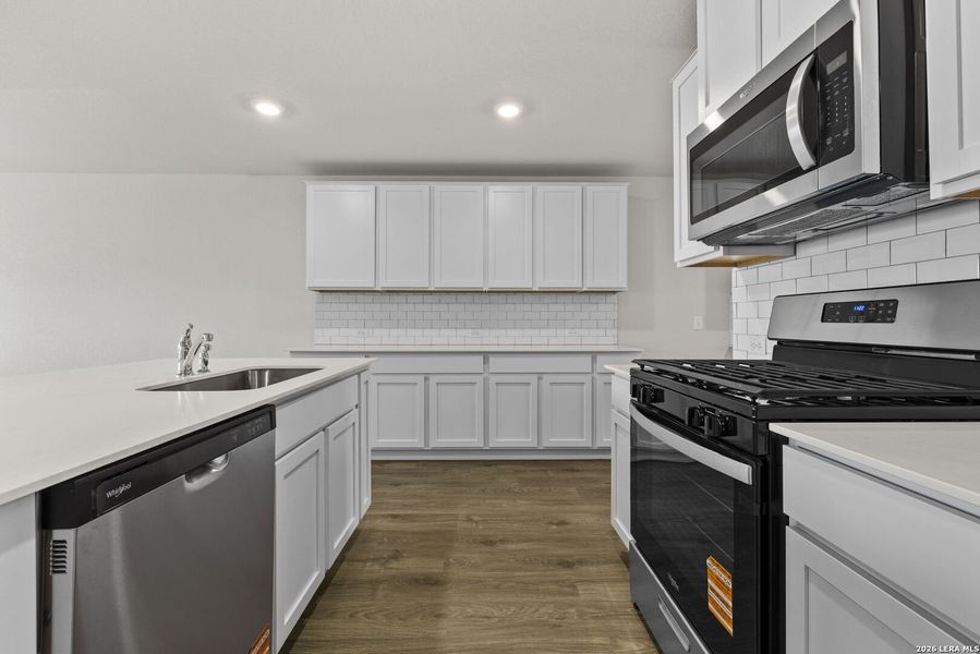 Furnished interior view inside a new home in Redbird Ranch, San Antonio (Image 9).
