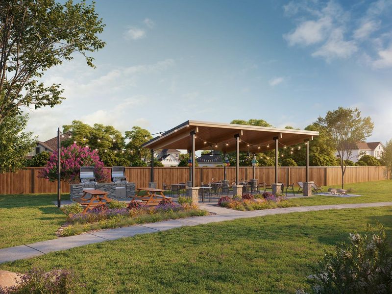 A community gathering space features a covered patio with string lights, perfect for outdoor dining and entertaining. A community gathering space features a covered patio with string lights, perfect for outdoor dining and entertaining.