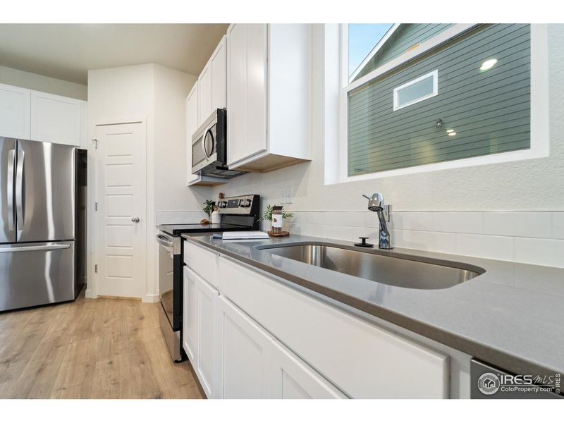 Furnished interior view inside a new home in Liberty Draw, Evans (Image 10).