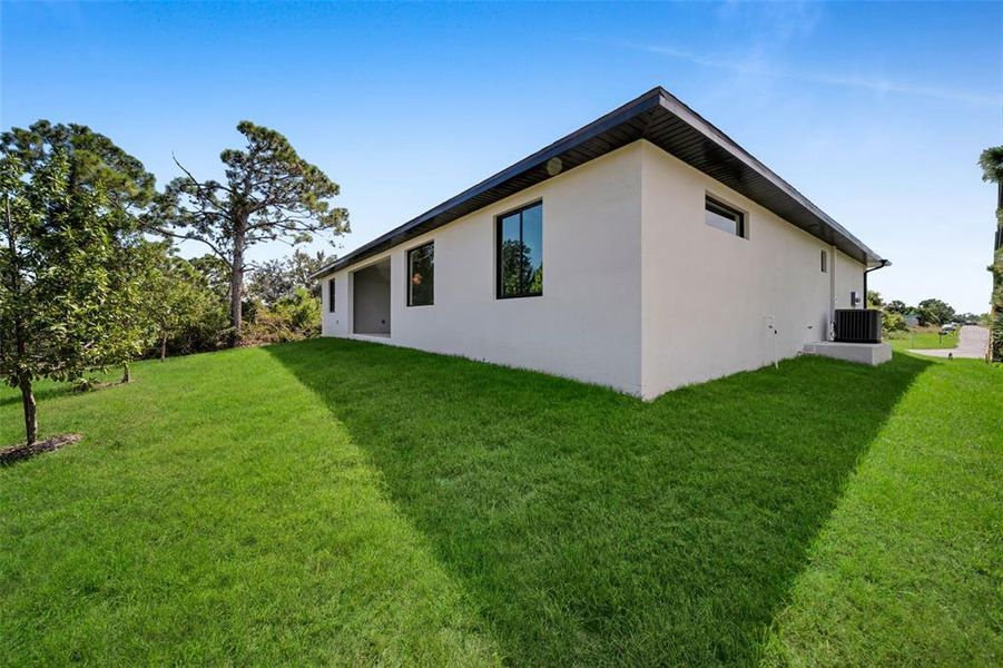 Exterior details and patio area of a home in , Port Charlotte (Image 18). Exterior details and patio area of a home in , Port Charlotte (Image 18).