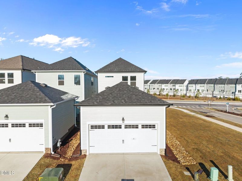 Front exterior of a new home in Forestville Yard, Knightdale, NC, highlighting curb appeal (Image 18).