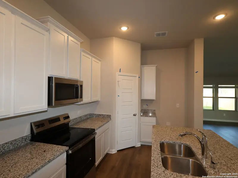 Furnished interior view inside a new home in Greenspoint Heights, Seguin (Image 8).