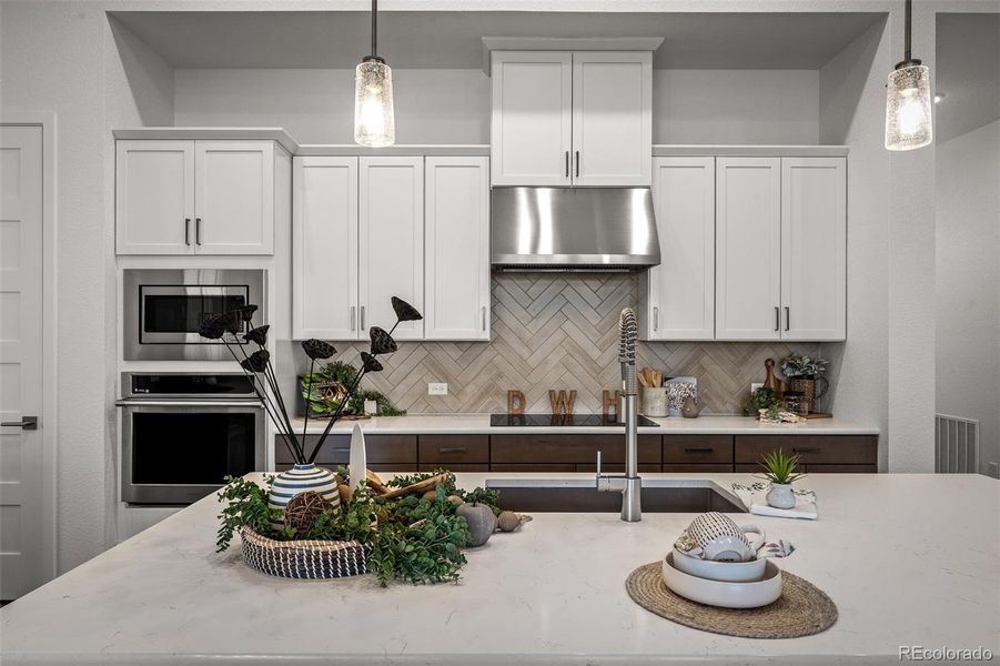 Furnished interior view inside a new home in Cloverleaf - Pinnacle Collection, Monument (Image 12).