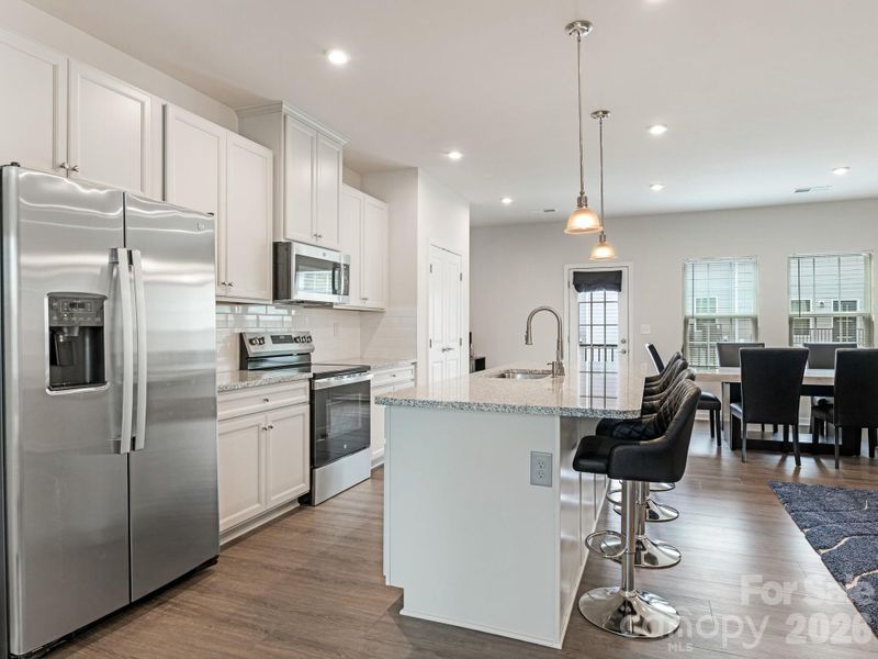 Furnished interior view inside a new home in Stone Creek Townhomes, Matthews (Image 8).