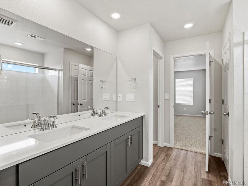 Furnished interior view inside a new home in Ridgeline Vista: The Flora Collection, Brighton (Image 18). Furnished interior view inside a new home in Ridgeline Vista: The Flora Collection, Brighton (Image 18).