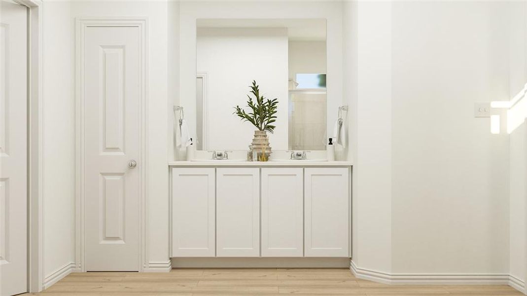 Bar with white cabinetry and light hardwood / wood-style flooring