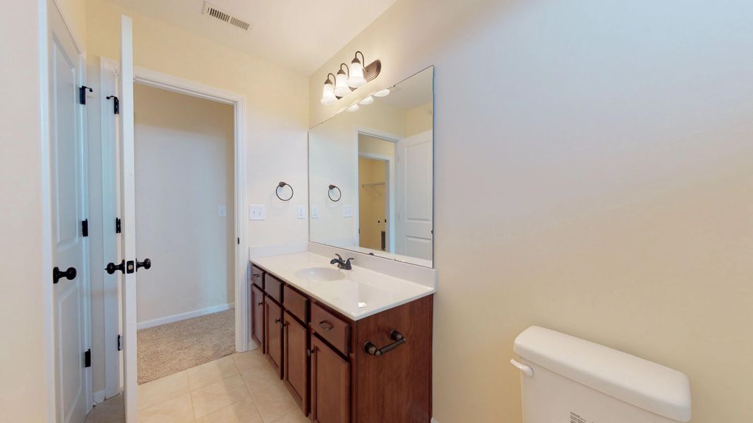 Representative furnished interior of a home built from the Rockbridge by Bill Clark Homes in Davenport Farms, Winterville (Image 19).