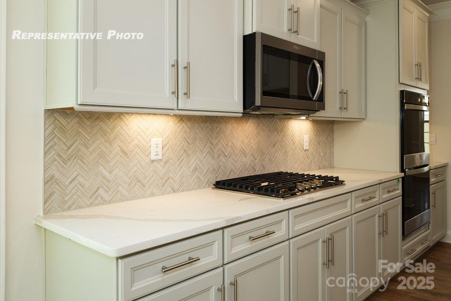 Furnished interior view inside a new home in Sylvan Creek, Denver (Image 3).