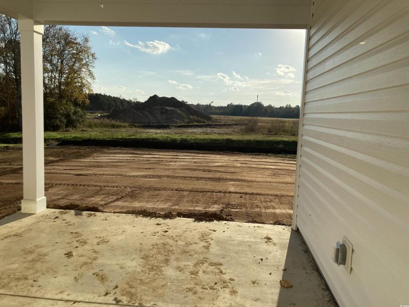 View of yard featuring a patio View of yard featuring a patio