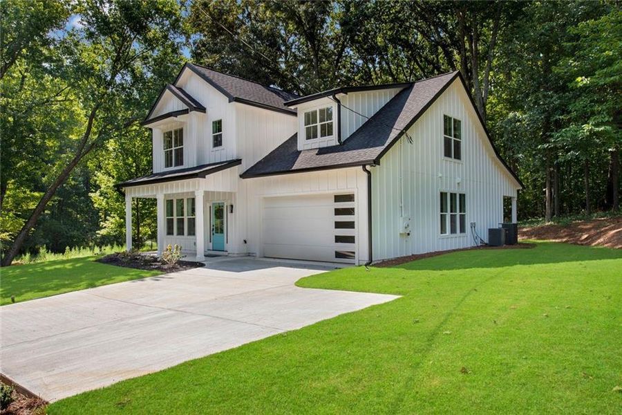 Front exterior of a new home in , Dallas, GA, highlighting curb appeal (Image 28). Front exterior of a new home in , Dallas, GA, highlighting curb appeal (Image 28).