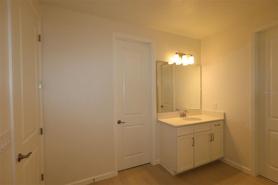 Furnished interior view inside a new home in Center Lake on the Park, St. Cloud (Image 15).