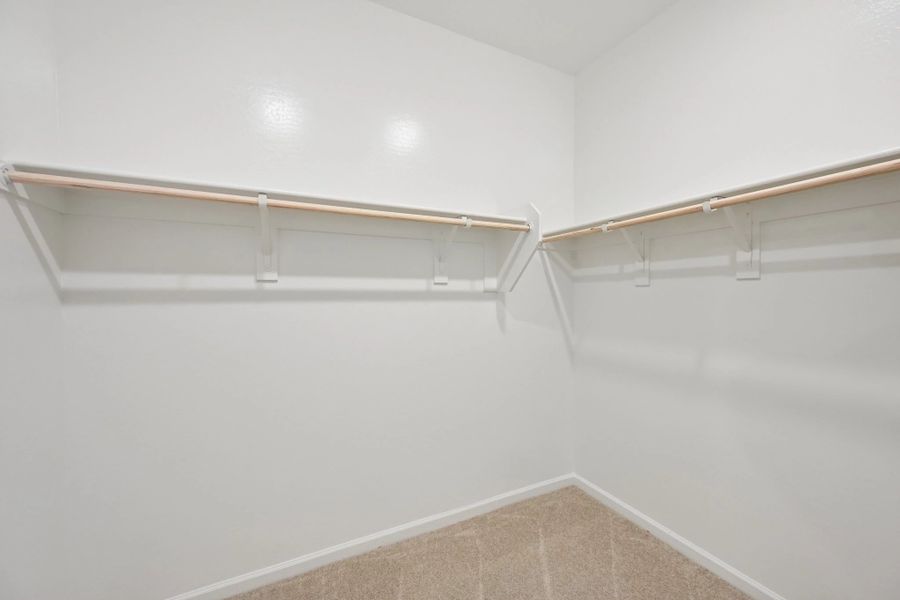 Primary walk in closet Primary walk in closet