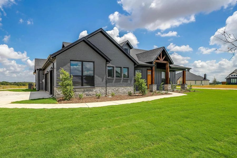 Representative exterior photo of a completed home built from the The Paxton by Elmwood Custom Homes in Byrum Ranch, Maypearl, TX (Image 1). Representative exterior photo of a completed home built from the The Paxton by Elmwood Custom Homes in Byrum Ranch, Maypearl, TX (Image 1).