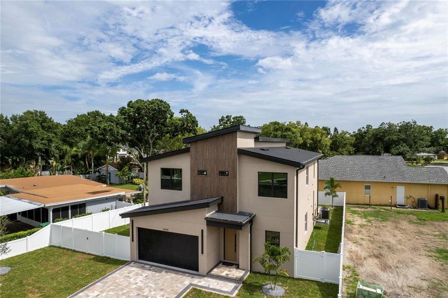 Front exterior of a new home in , Tampa, FL, highlighting curb appeal (Image 32).