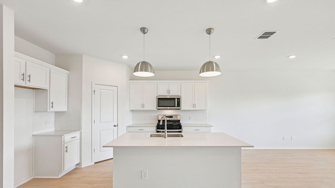 Furnished interior view inside a new home in Valverde, Bastrop (Image 7).