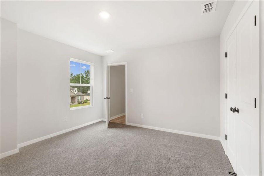 Spacious, unfurnished interior of a new home in Windsong Estates, McDonough (Image 19).