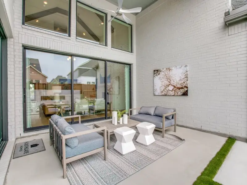 Exterior details and patio area of a home in Windsong Ranch 61' Series, Prosper (Image 2).