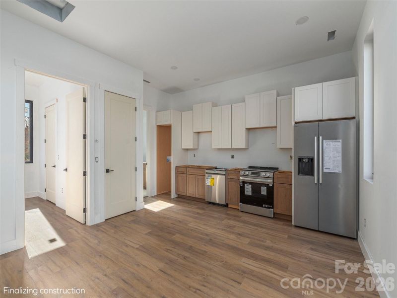 Furnished interior view inside a new home in , Waynesville (Image 3).
