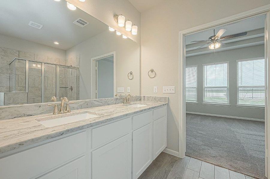 Furnished interior view inside a new home in Grand Magnolia, Magnolia (Image 18).