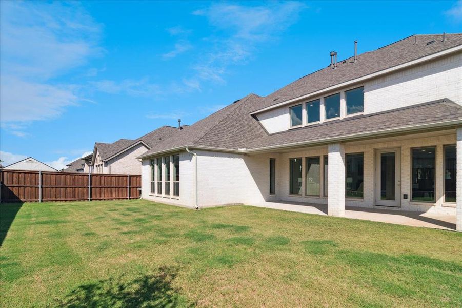 Exterior details and patio area of a home in , Little Elm (Image 1).