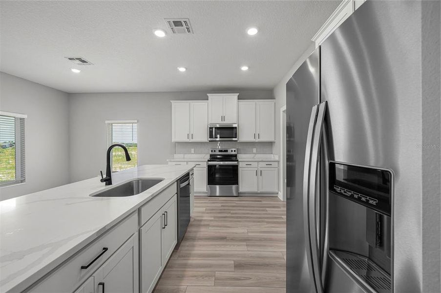 Furnished interior view inside a new home in Gum Lake Preserve, Lake Alfred (Image 7). Furnished interior view inside a new home in Gum Lake Preserve, Lake Alfred (Image 7).