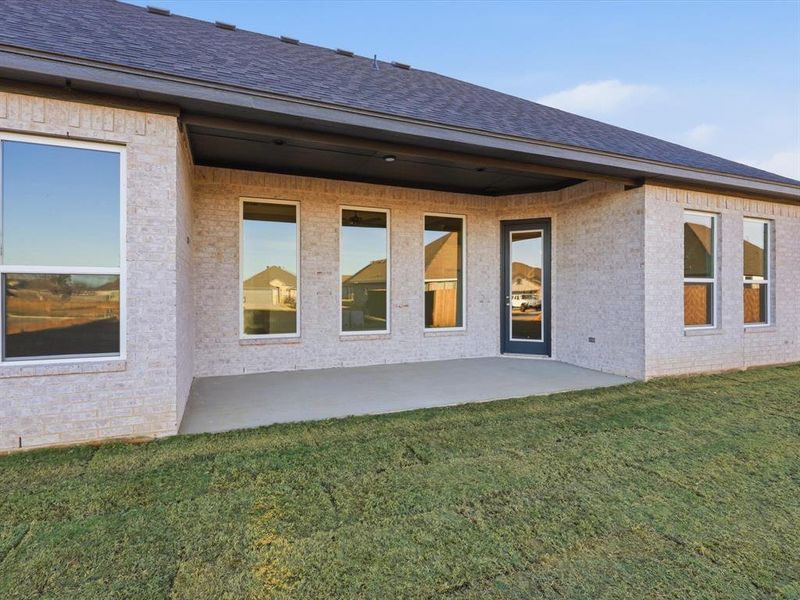 Exterior details and patio area of a home in , Tolar (Image 23).